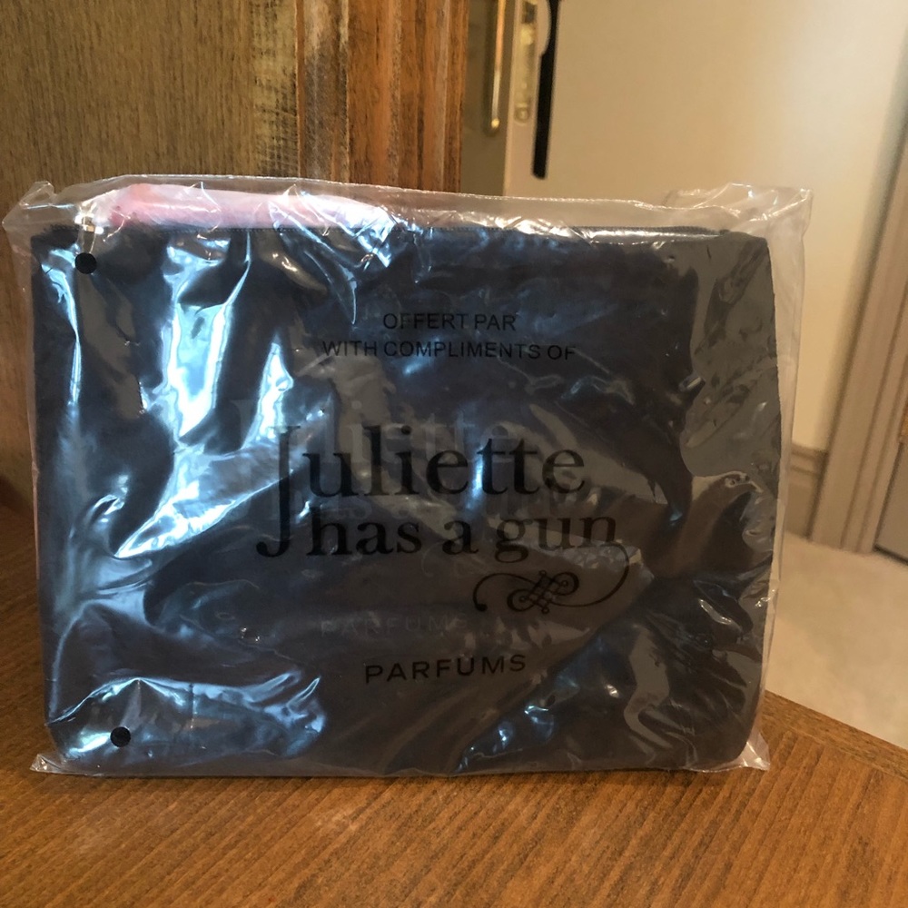 MOVING SALE! Juliette has a gun makeup bag